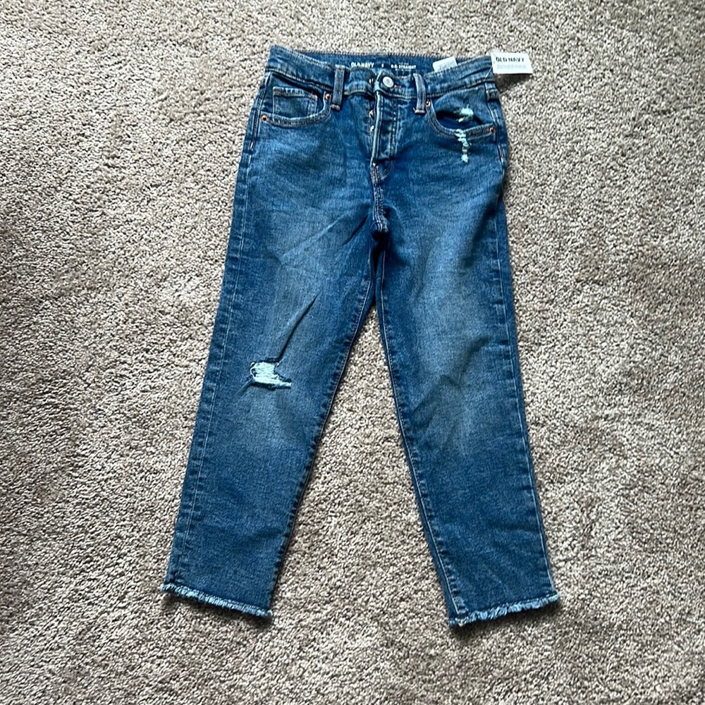 Brand new old navy straight leg jeans girls sz 8. Frayed at the ankle. Adj waist